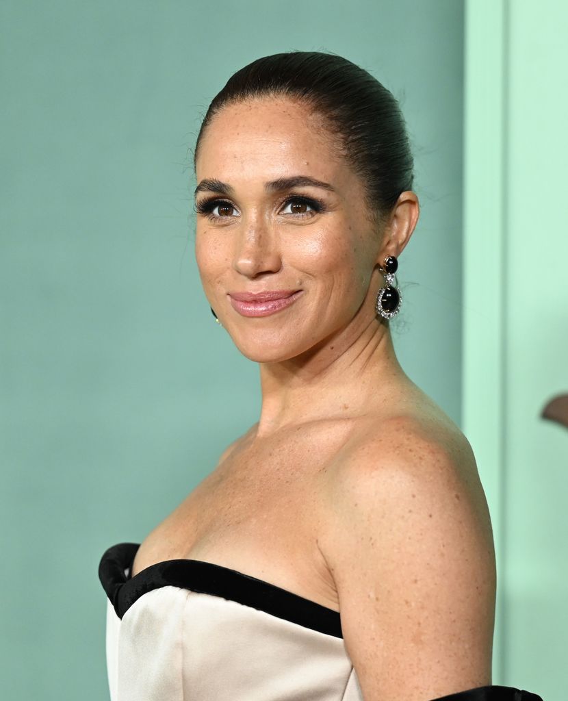 Meghan Markle side on close up in strapless gown