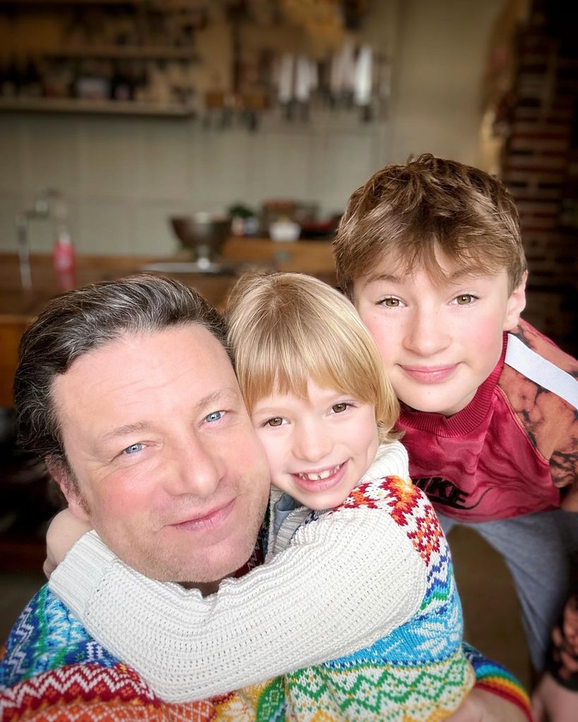 Jamie in selfie with two sons